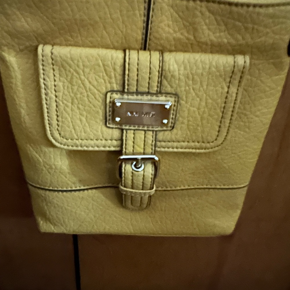 Nine West Mustard Yellow faux leather crossbody bag w/front pocket. Never used